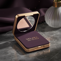 VELARA Sheer Tint Blush compact with gold trim open to reveal rose-gold powder